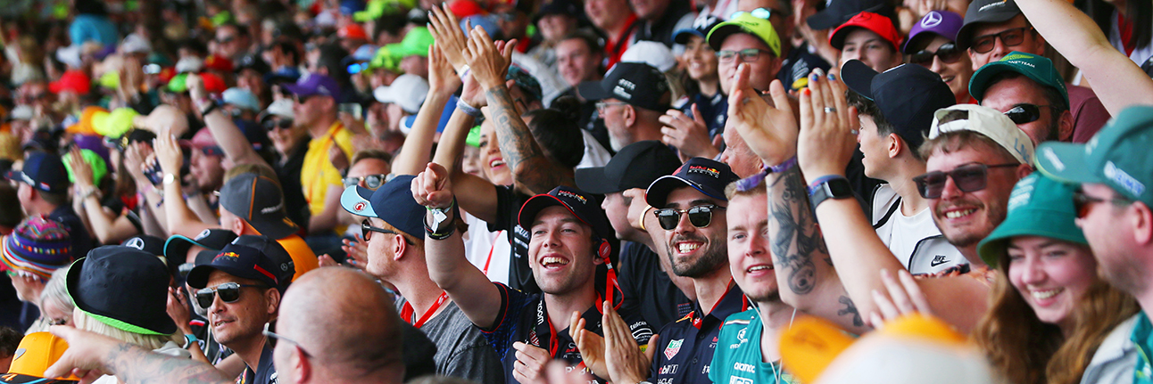 F1 fans enjoying the British Grand Prix from the grandstands