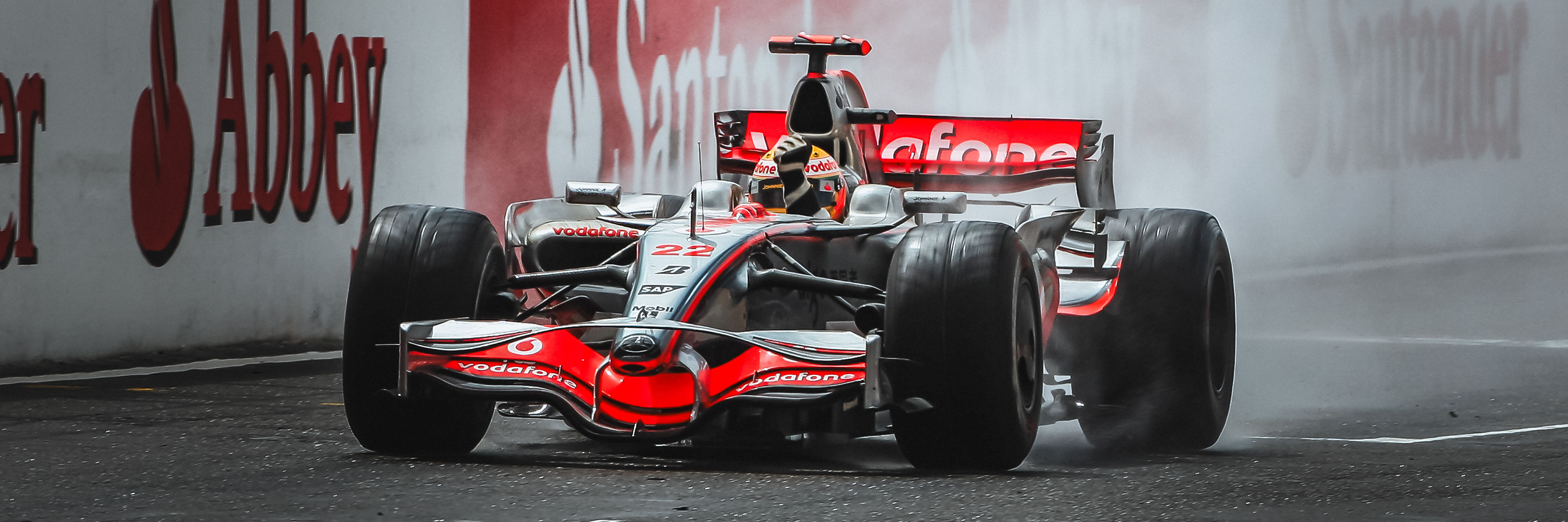 Lewis Hamilton crossing the line to win an all-time F1 epic at Silverstone in 2008