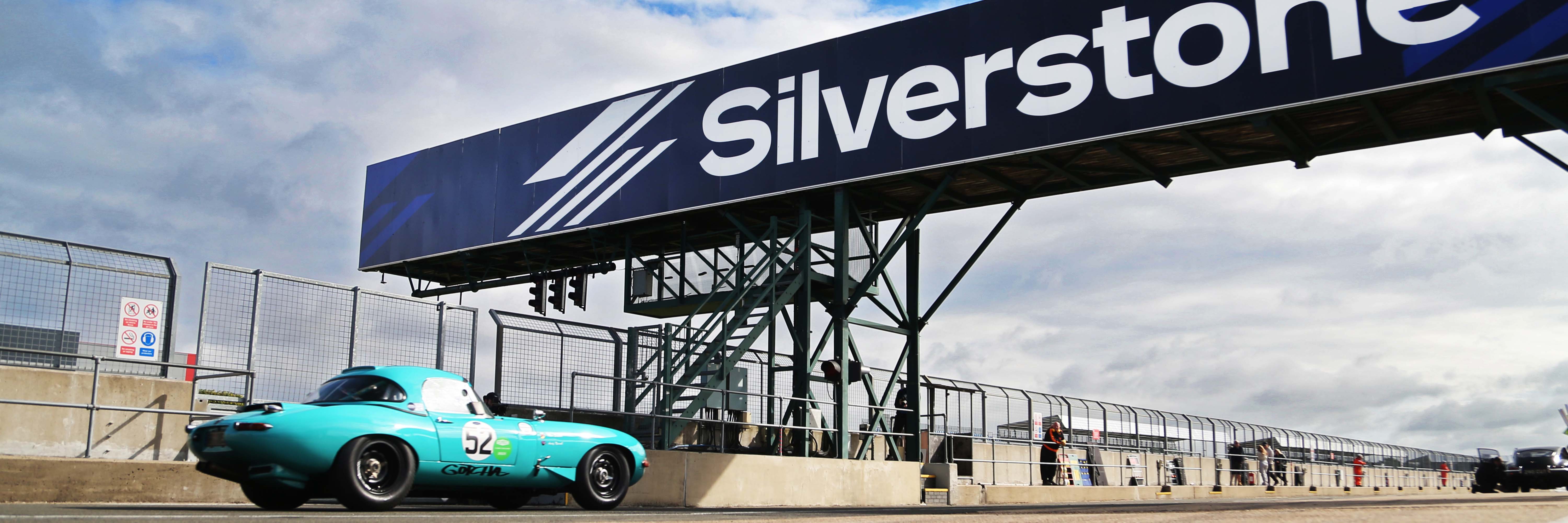 A Jaguar E-Type in the pits at Silverstone Festival