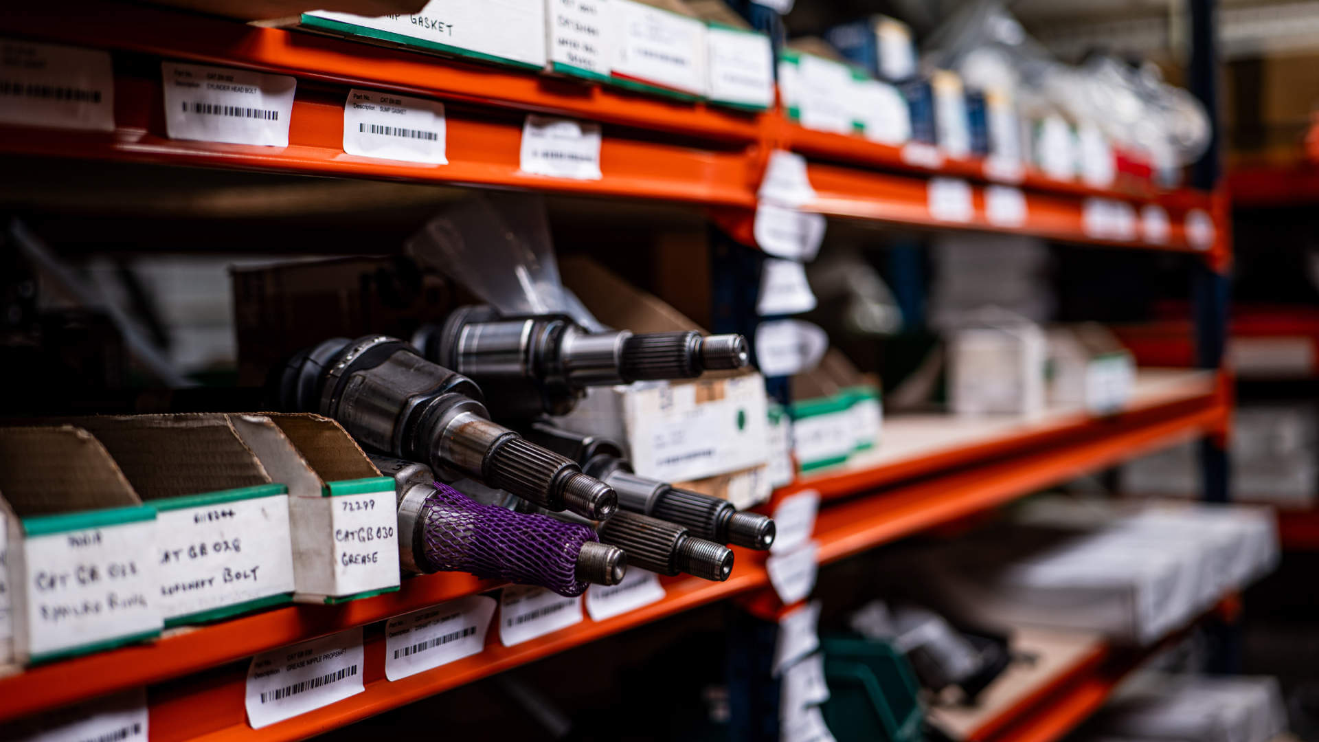 A shelf full of car parts