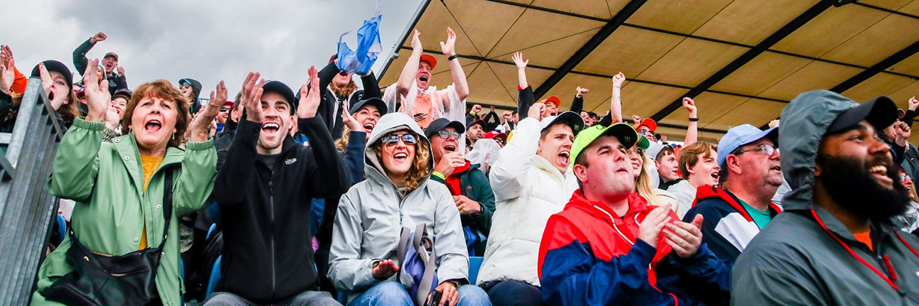 Fans celebrating George Russell's pole position at the British Grand Prix