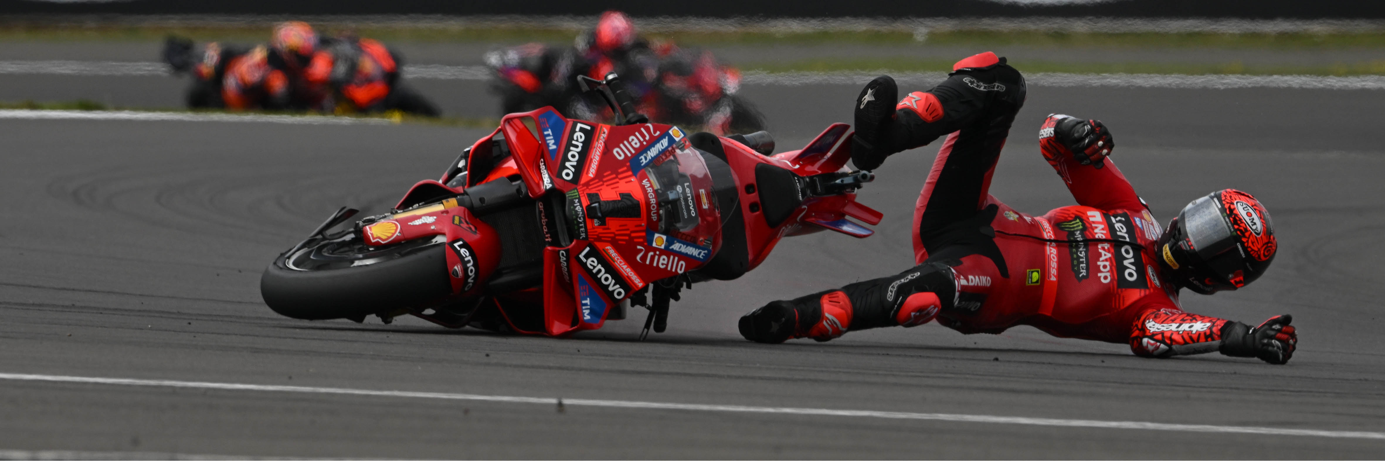 Francesco Bagnaia falls off during the 2024 MotoGP Sprint at Silverstone