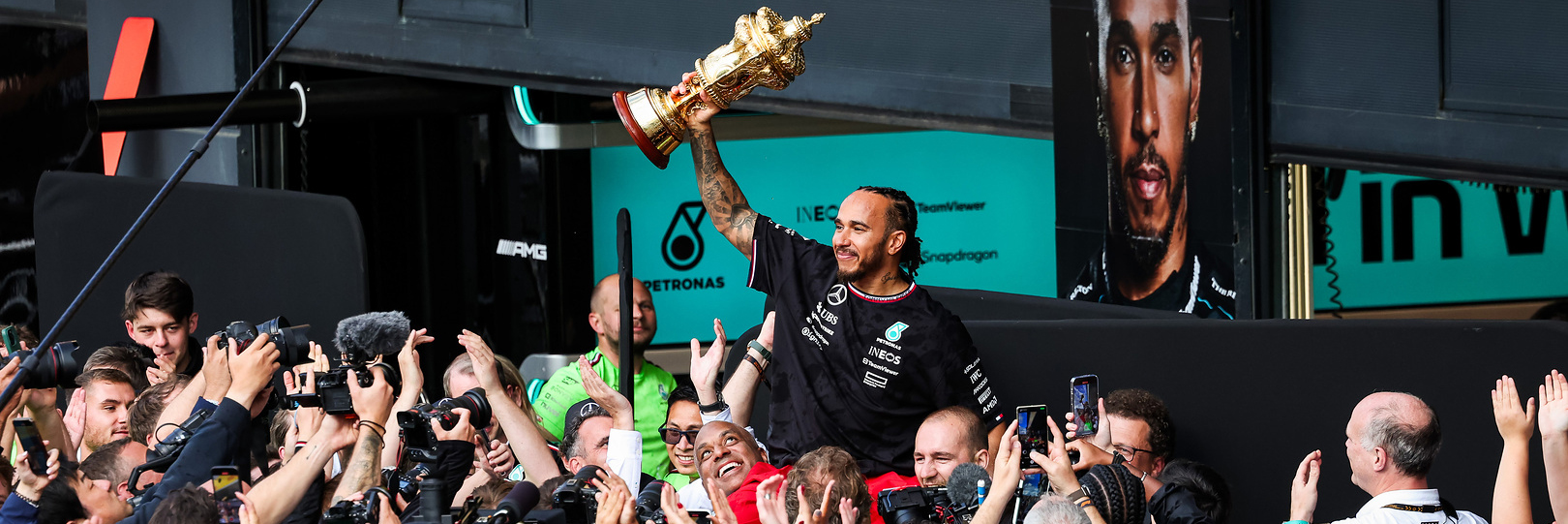 Hamilton with the 2024 British Grand Prix trophy