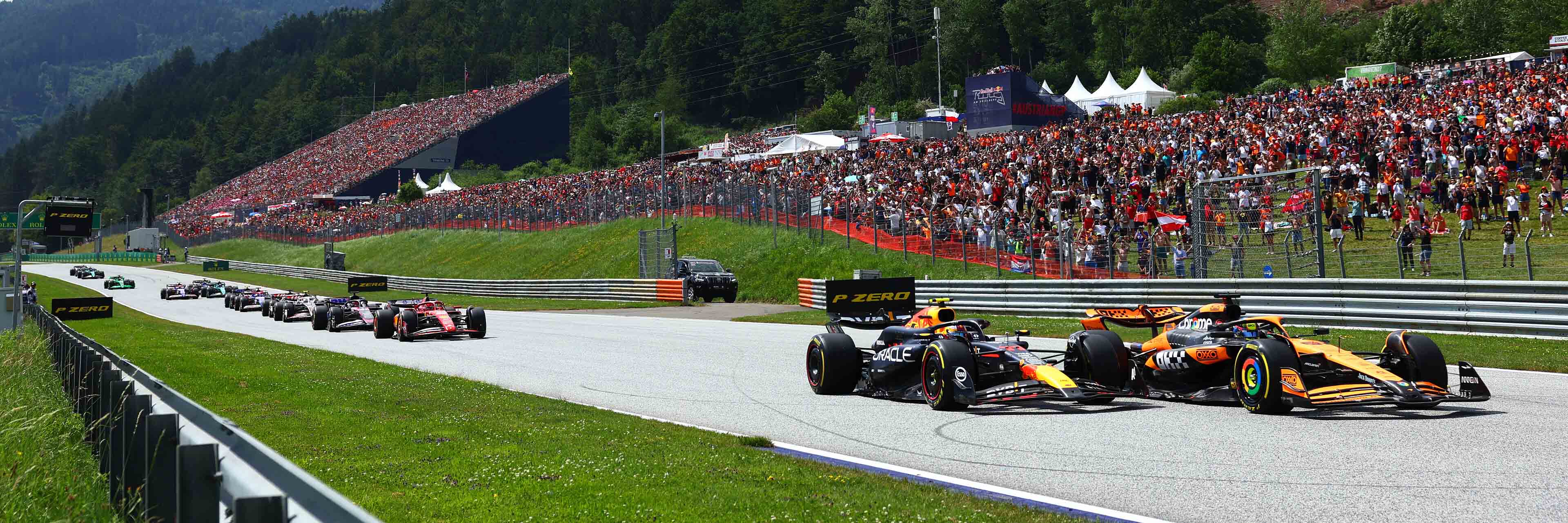 Max Verstappen and Lando Norris go wheel to wheel at the Red Bull Ring