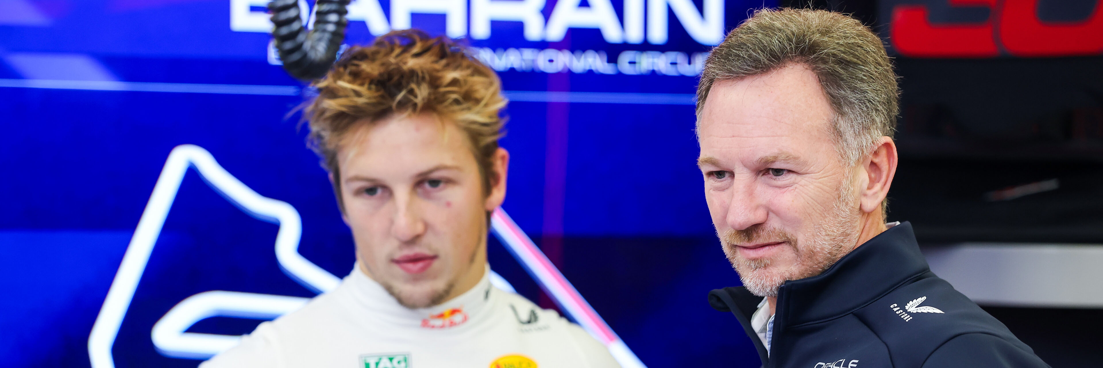 Liam Lawson and Christian Horner 