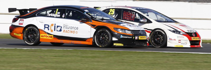 Colin Turkington racing Matt Neal at Silverstone