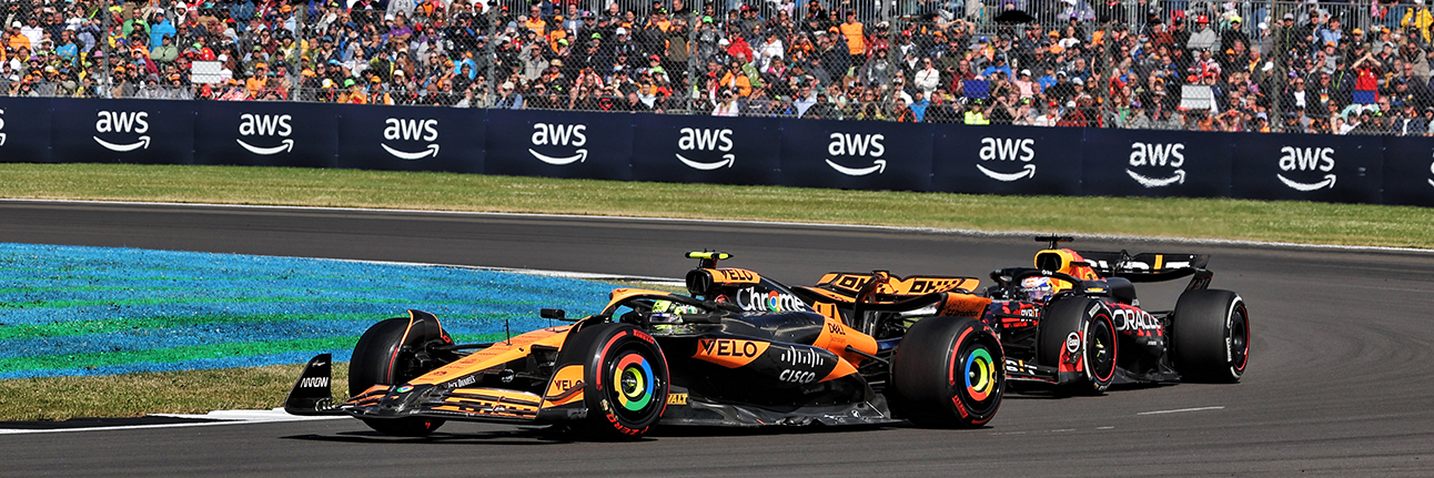 Lando Norris and Max Verstappen fighting on track at the 2024 British Grand Prix