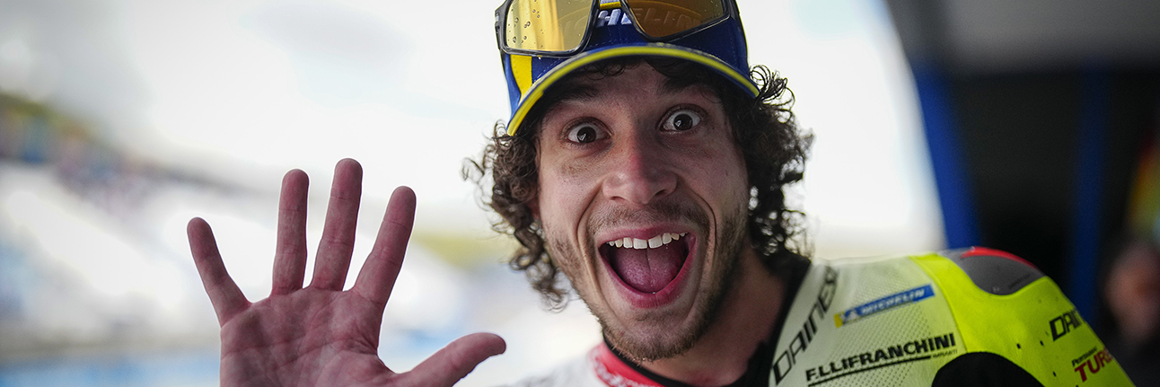 Marco Bezzechi celebrates his podium in Jerez