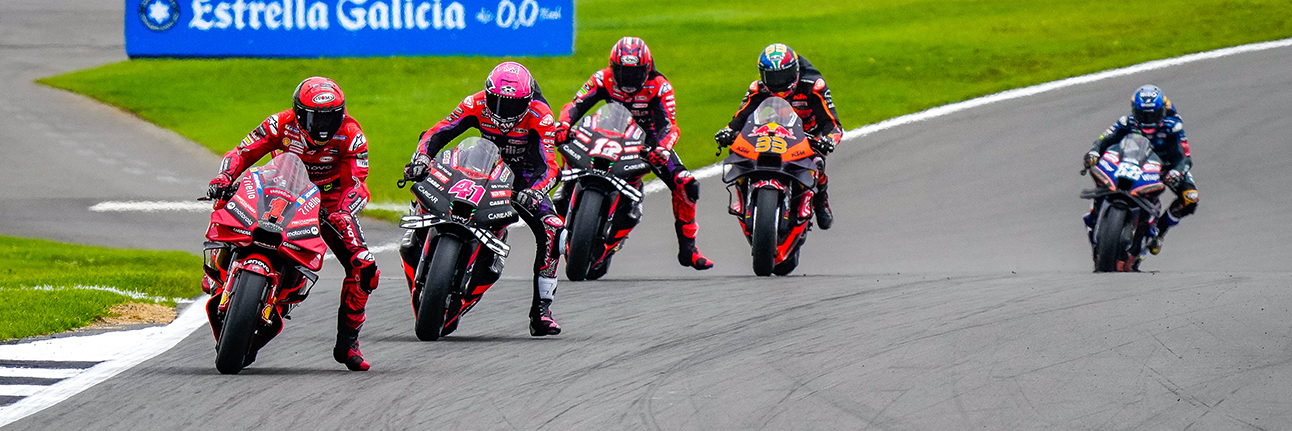 Francesco Bagnaia leads Aleix Espargaro and Maverick Vinalez at Vale in the 2023 MotoGP British Grand Prix