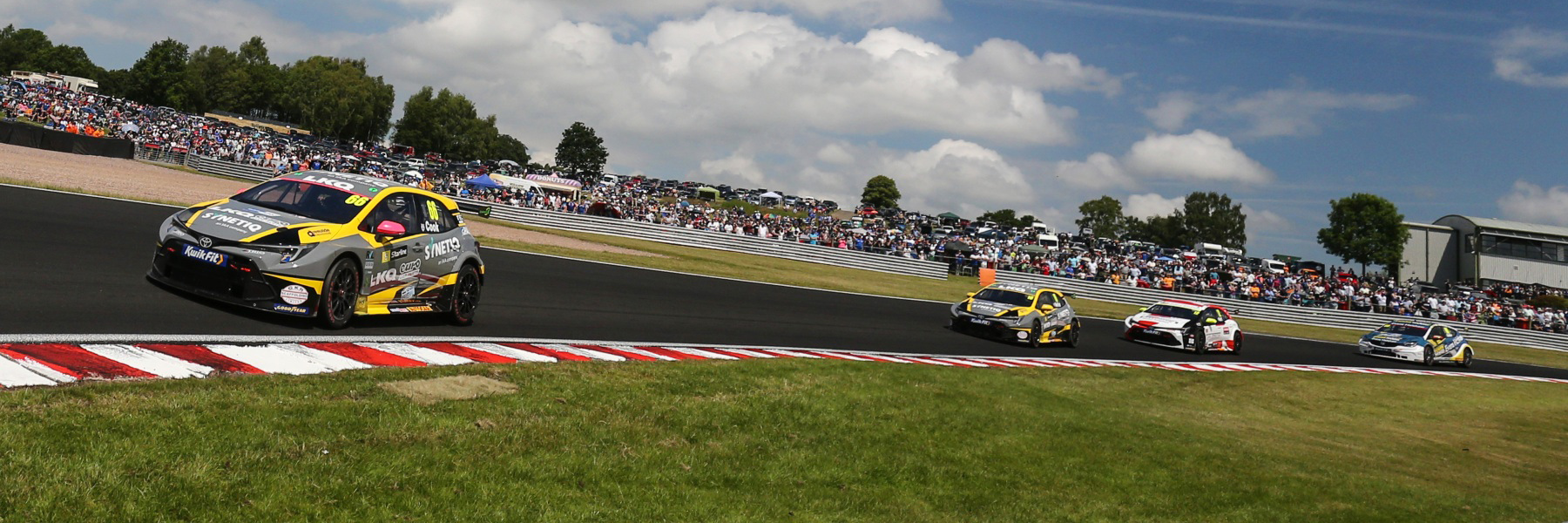 Josh Cook leads the pack at Oulton Park's 2024 BTCC race