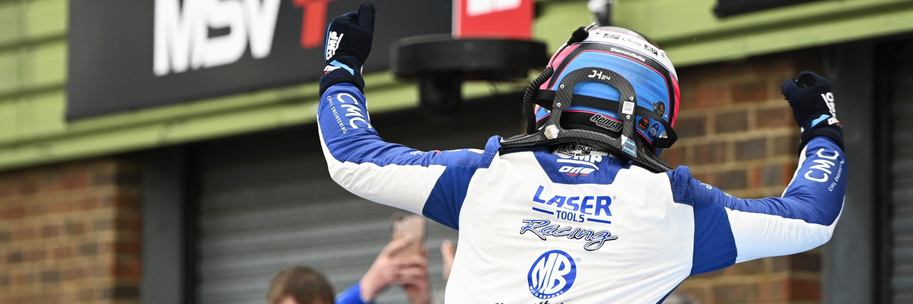 Jake Hill celebrates winning a 2024 BTCC race at Snetterton