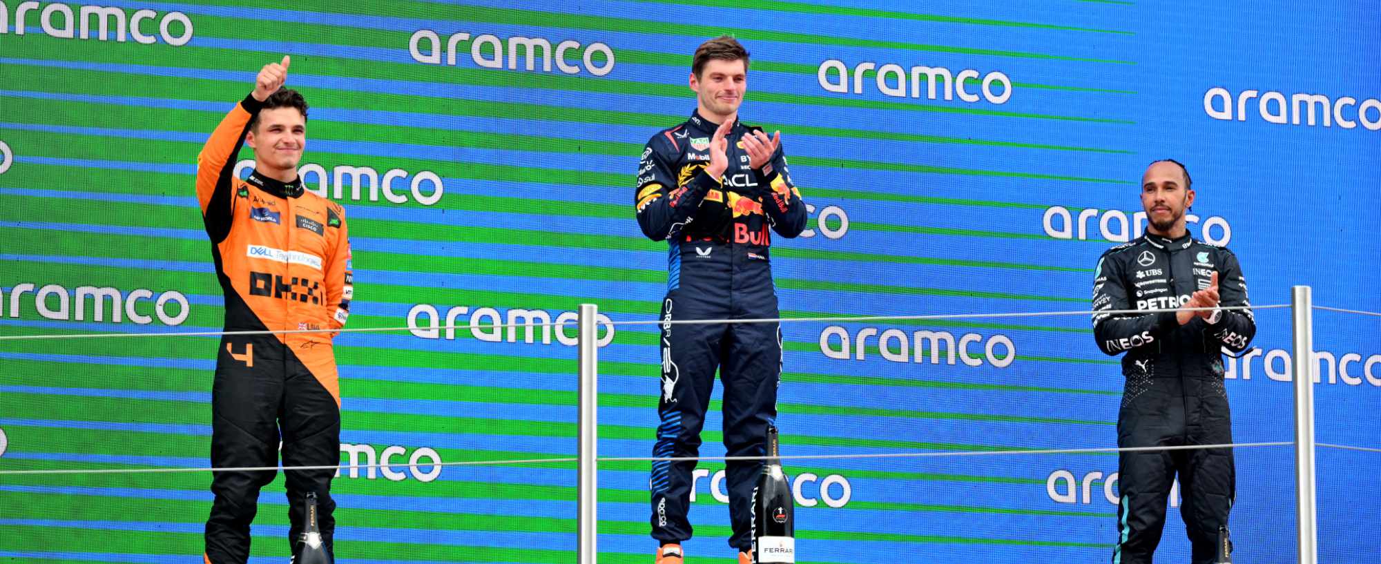L-R lando Norris, Max Verstappen, and Lewis Hamilton ont he podium at Spanish Grand Prix