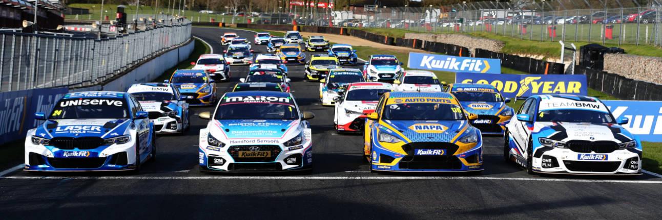 BTCC Cars line up on the start line