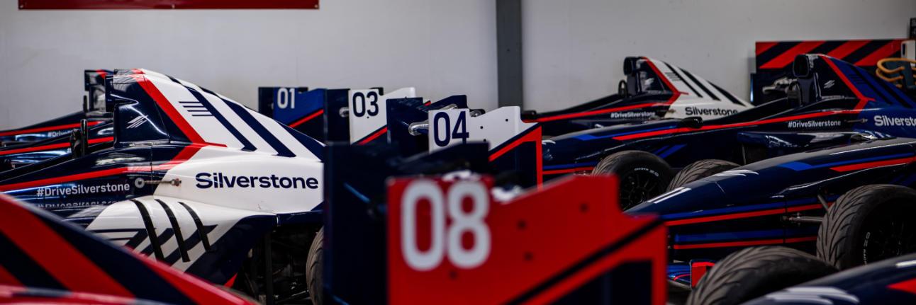 Single Seater race cars line up waiting for their drive weekend