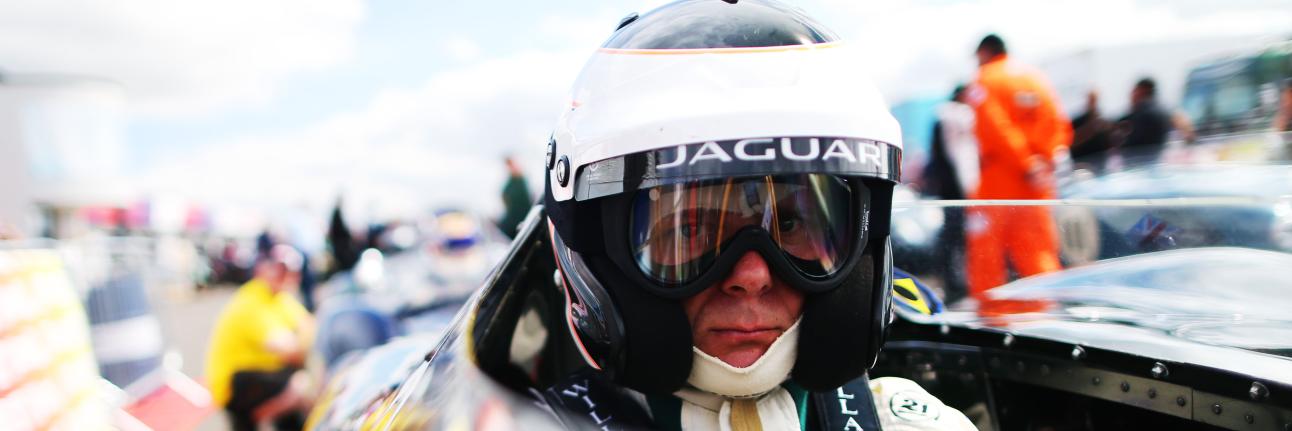 A driver prepares to race in classic F1 machinery at Silverstone Festival