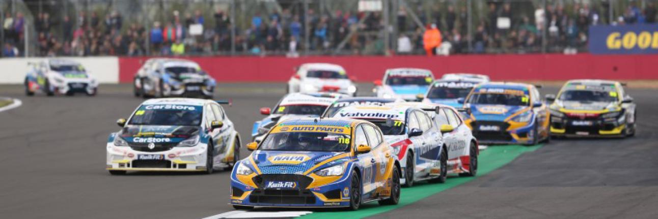 BTCC action at Silverstone with Ash Sutton at the head of the field