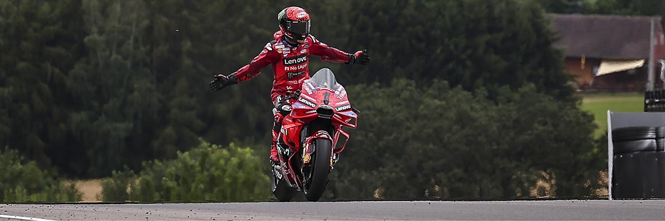 Francesco Bagnaia celebrates winning the 2024 Sachsenring MotoGP race
