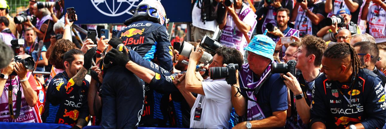 Verstappen jumps into crowd celebrating a hard-fought victory for his team