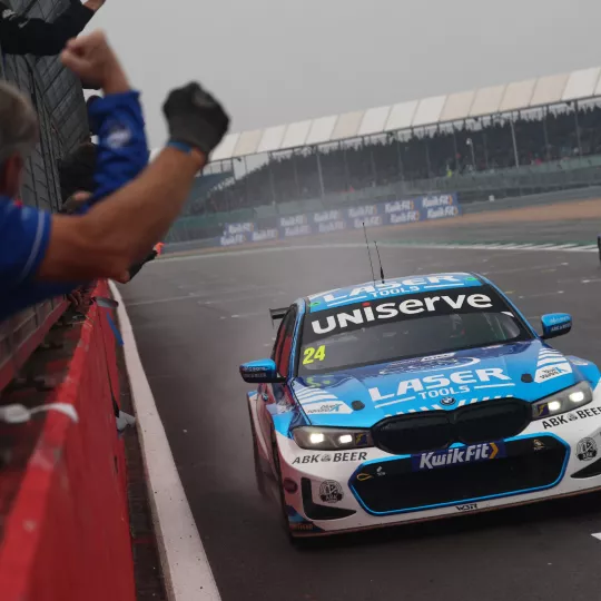 BTCC cars racing on the track at Silverstone