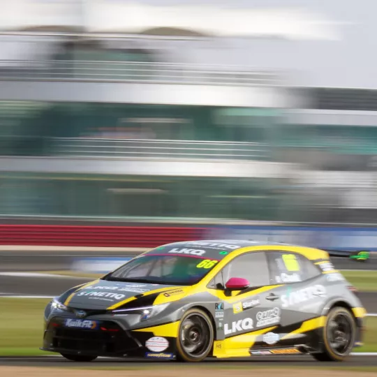 BTCC cars racing on the track at Silverstone