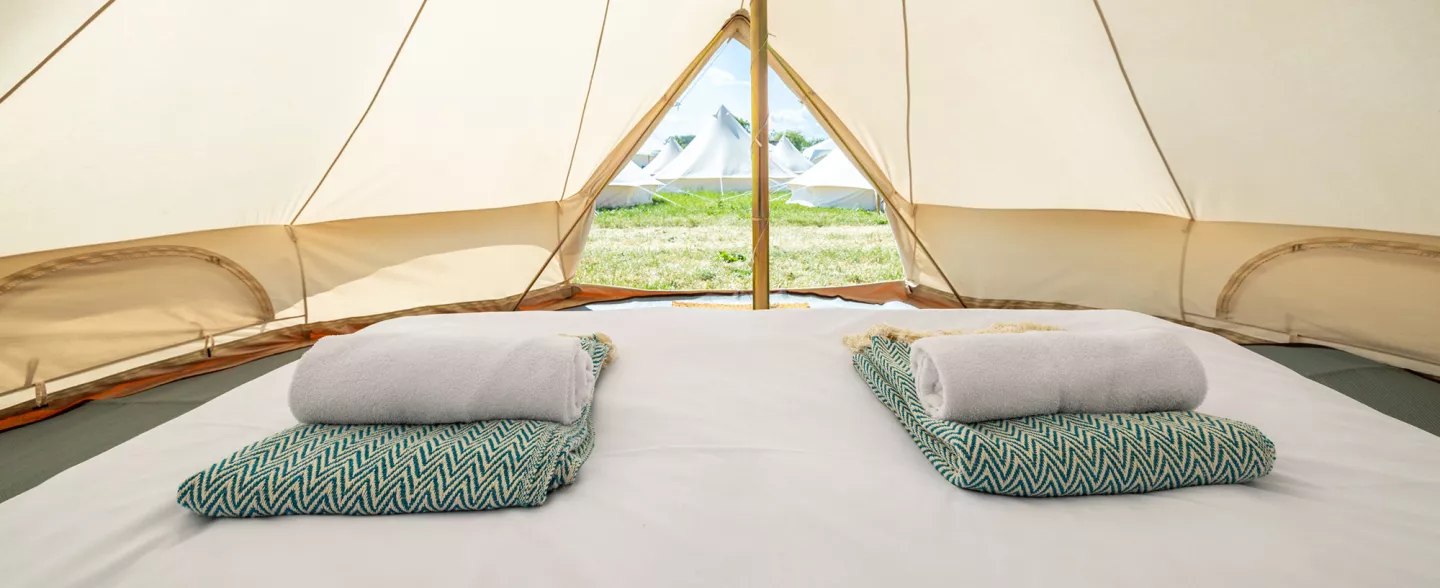 inside shot of the deluxe bell tent at the pop up hotel